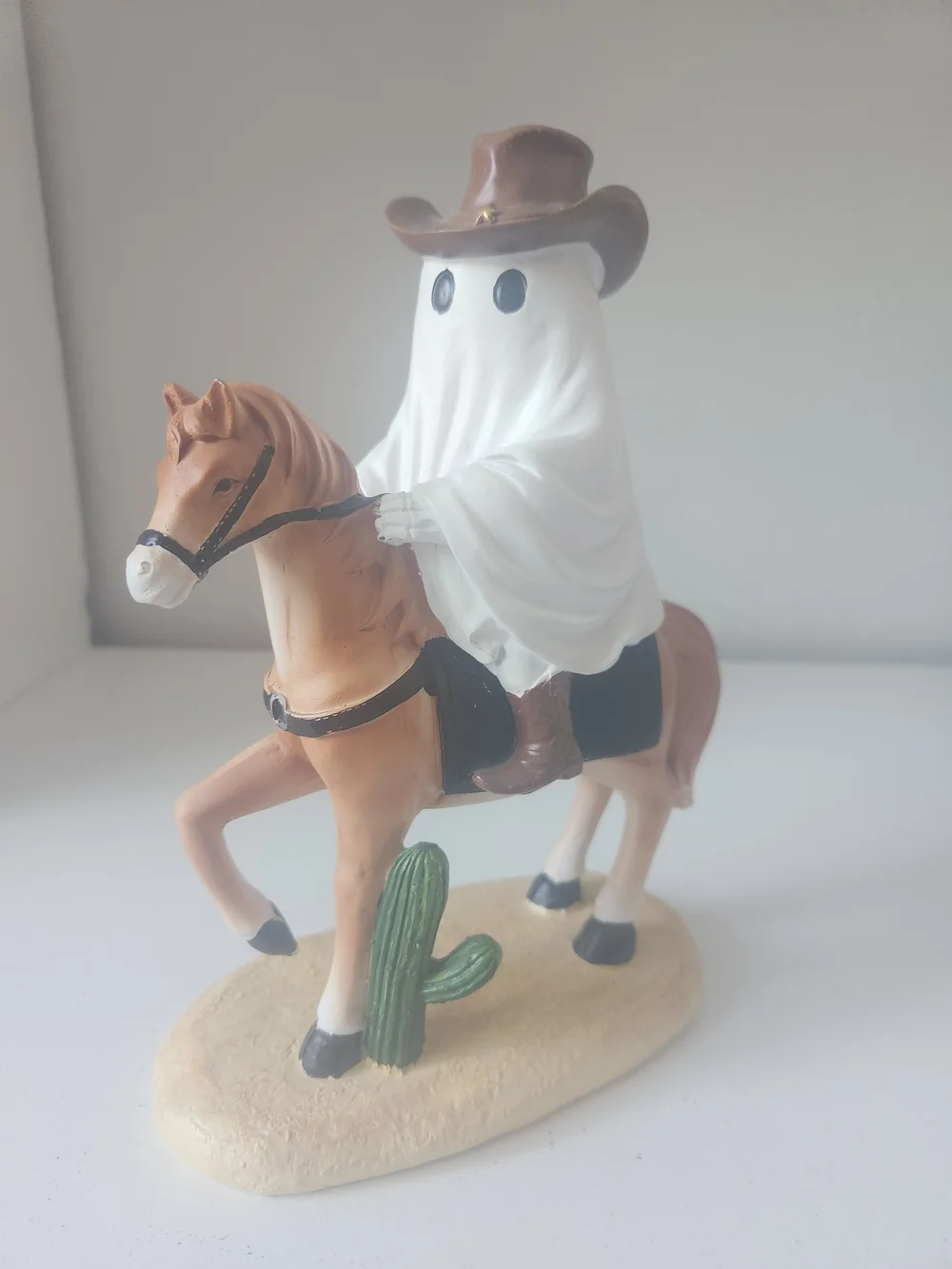 Ghost Cowboy Riding A Horse Figurine - White and Brown Western Decor Resin
